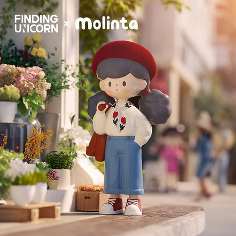 Molinta Retro Girl vinyl figure wearing a red beret, white blouse with tulip print, and blue trousers.