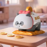 Mr. PA panda piggy bank figure resting on a money cushion surrounded by gold coins