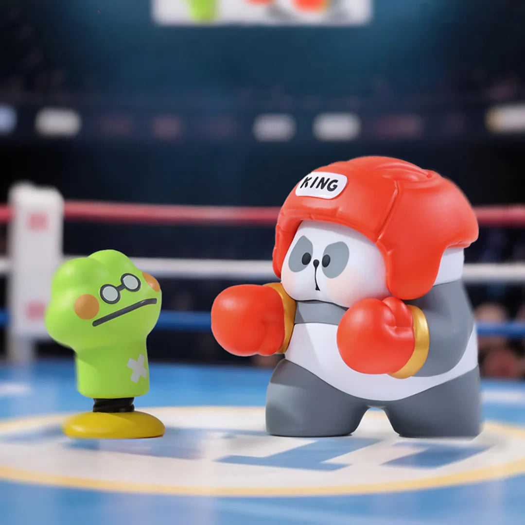 Mr. PA boxing champion figure wearing red gloves and headgear inside a boxing ring