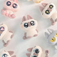 Nobeko Moe Azukisan Mini Bean Series Blind Box collection featuring flocked cat character figures with expressive eyes