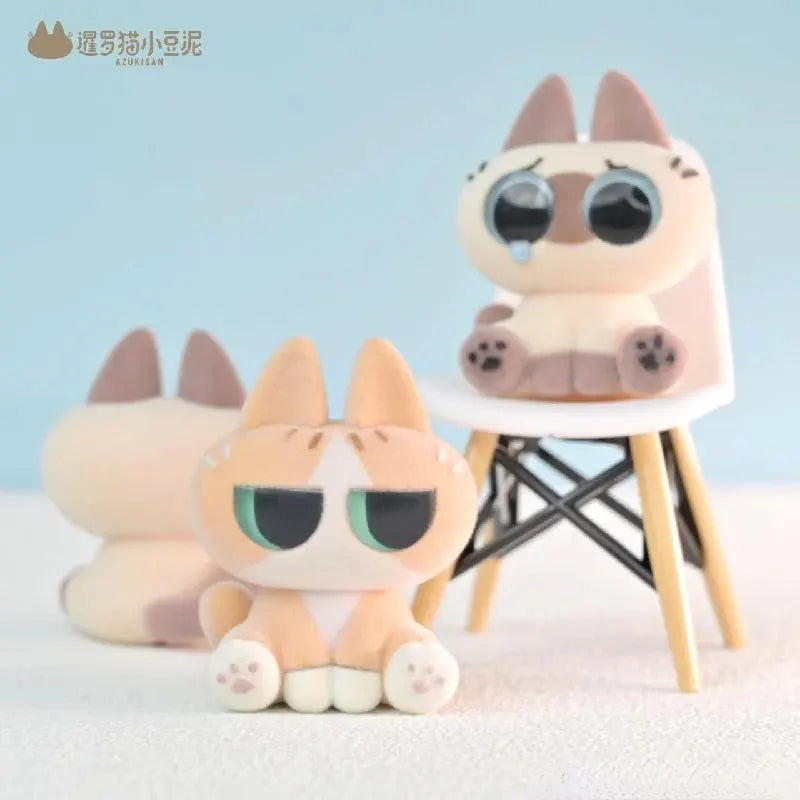 Azukisan cat figures displaying different emotional expressions including crying and grumpy faces