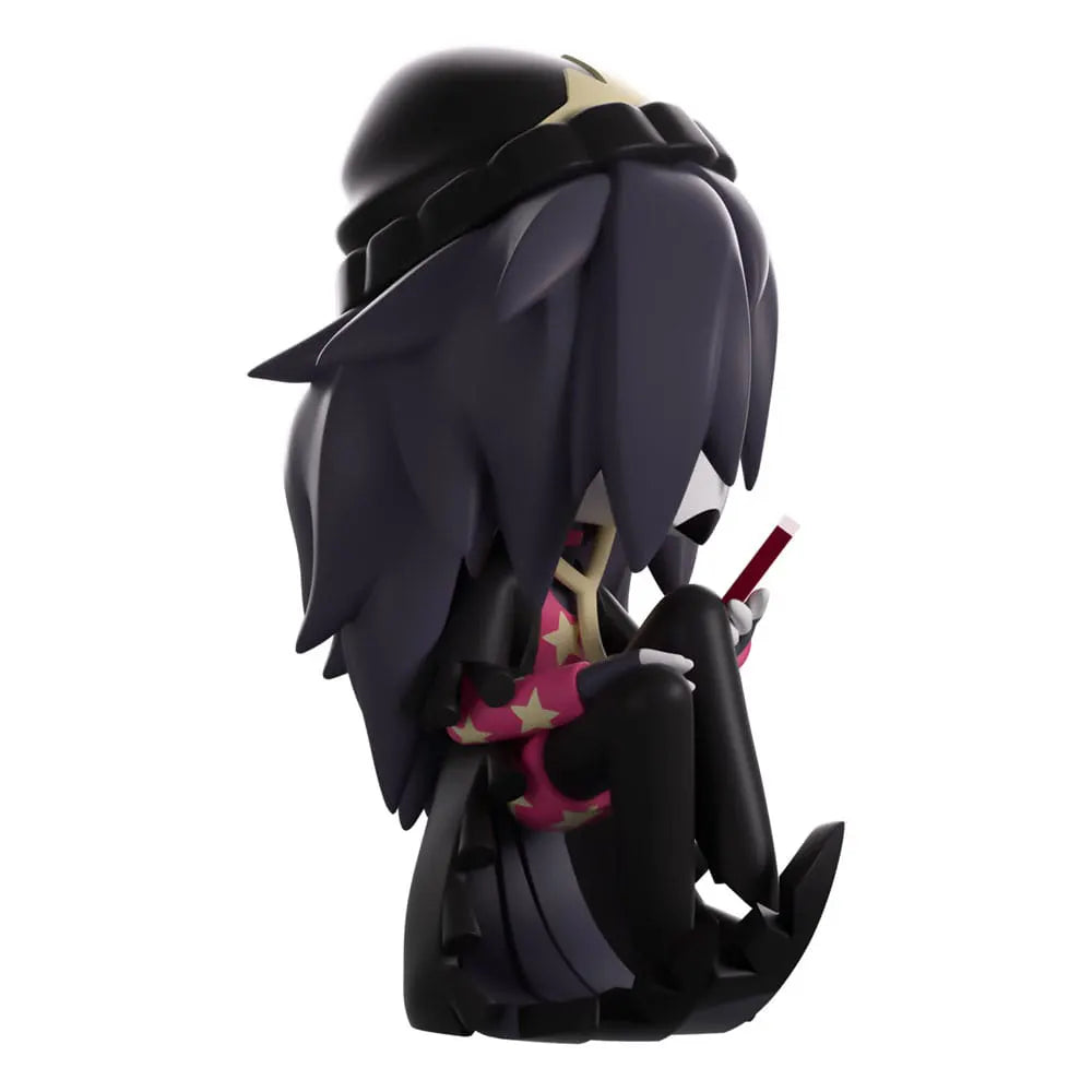 Side view of Octavia Youtooz Vinyl Figure holding phone with star-pattern dress