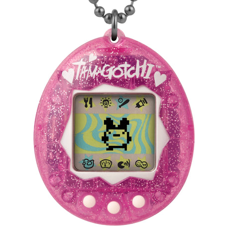 Close-up of Tamagotchi Pink Glitter screen with digital pet character.