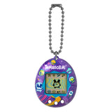 Tama Universe Tamagotchi with keychain, purple shell decorated with planets and rockets.