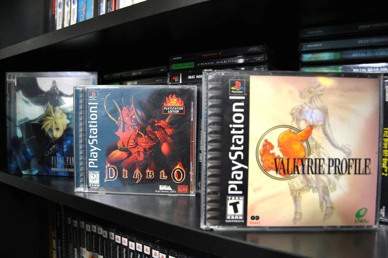 PlayStation 1 game collection displayed in clear PET protectors