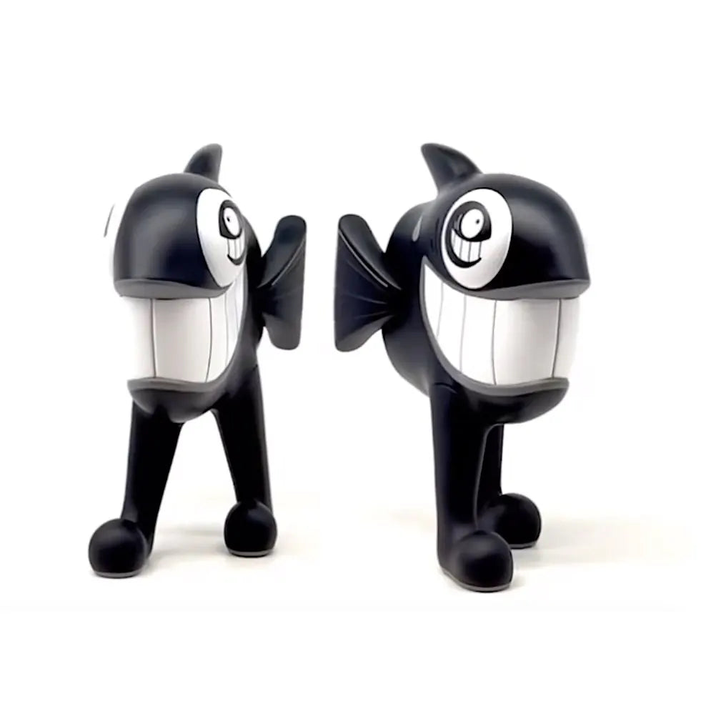Front-facing view of The Walking Fish "Black" edition vinyl figure by Pez