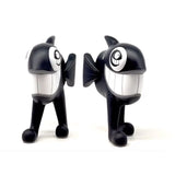 Front-facing view of The Walking Fish "Black" edition vinyl figure by Pez