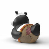 Mini TUBBZ Po duck figure showing detailed back with wrapped trousers