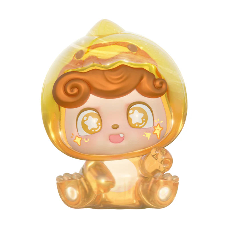 Clear golden Q Kid figure with star-filled eyes.