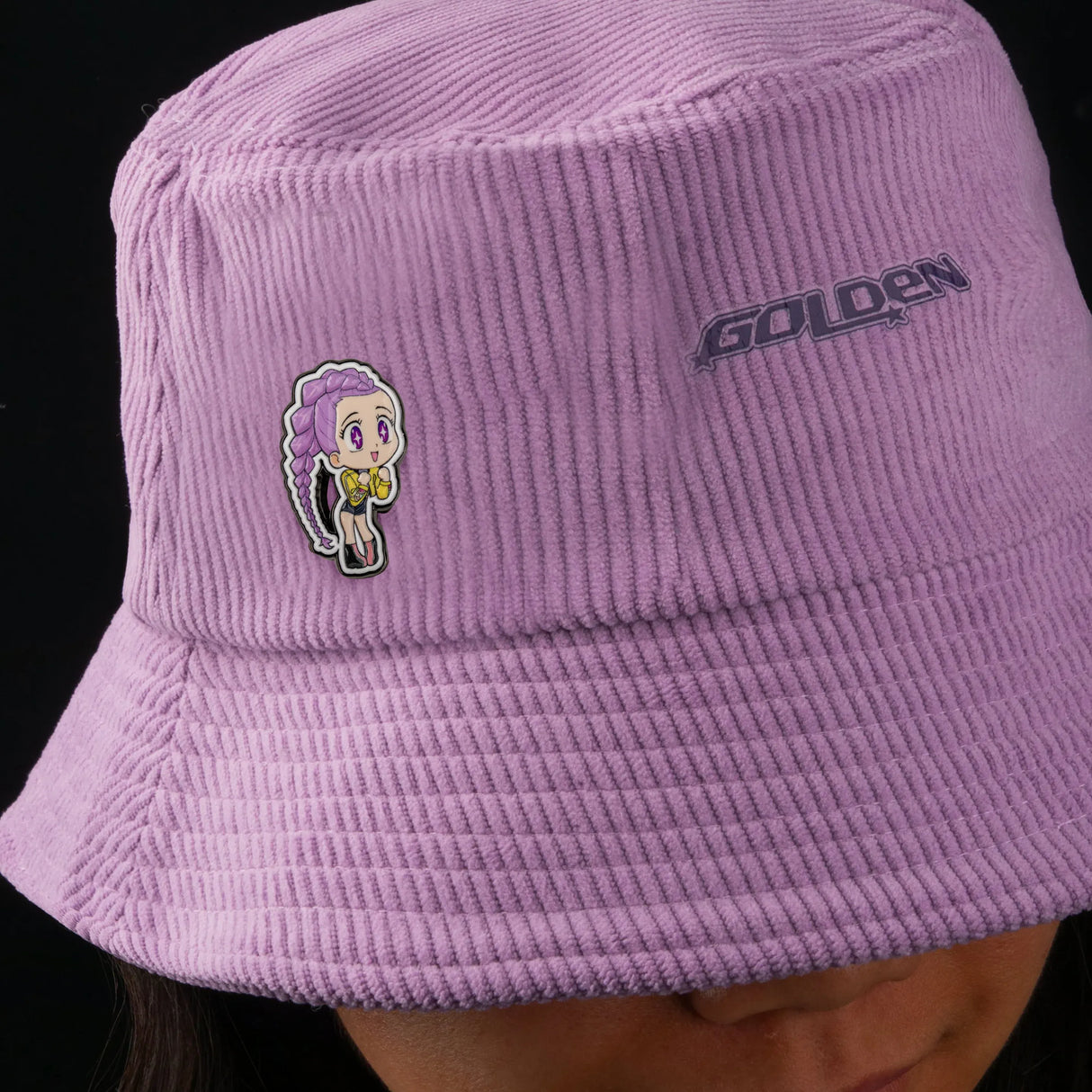 Rumi pin on purple bucket hat styling