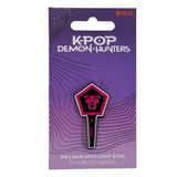 Saja Boys lightstick pin on official KPop Demon Hunters packaging