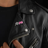 Saja Boys pin worn on black leather jacket