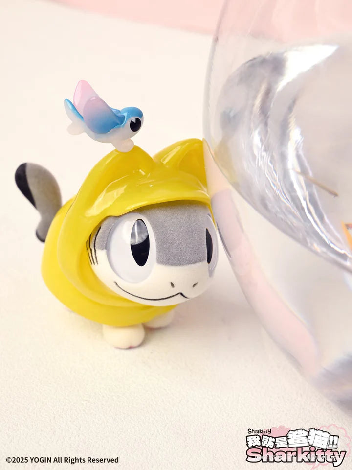 Sharkitty blindbox vinyl figure in yellow hoodie with blue bird on head