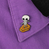 Skull Surfer hard enamel pin worn on purple jacket fabric