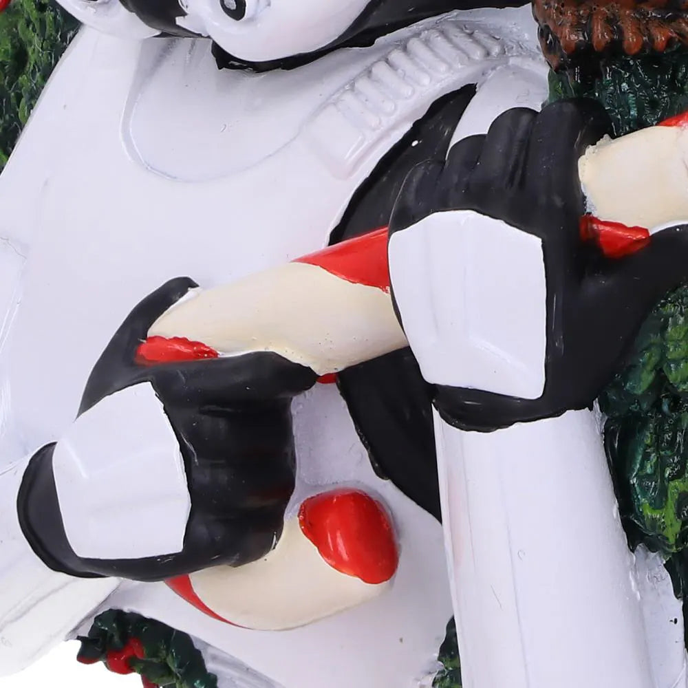 Close-up of Stormtrooper holding a candy cane