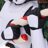 Close-up of Stormtrooper holding a candy cane