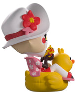 Rear side view of Summer Lucifer Hazbin Hotel Youtooz figure showing floral shirt and hat