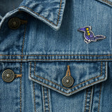 Sussie pin worn on denim jacket