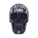 Black skull piggy bank with tattoo-style design – front view