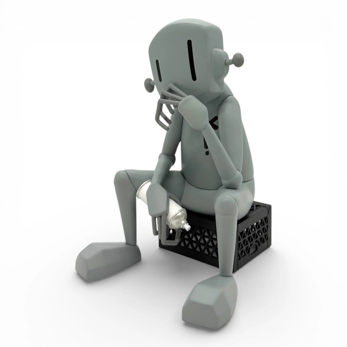 chrisrwk the thinker vinyl figure front view robot sitting crate