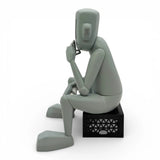 chrisrwk thinker vinyl figure angled front seated robot