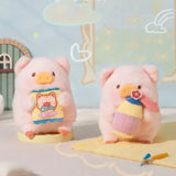 LuLu The Piggy plush holding a snack bag and another character holding a colorful toy cupcake