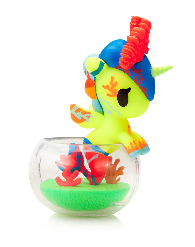 Tokidoki Neon Reef Mermicorno blind box figure with neon coral reef design glowing under blacklight