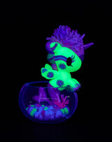 Tokidoki Neon Reef Mermicorno neon yellow coral variant glowing under blacklight