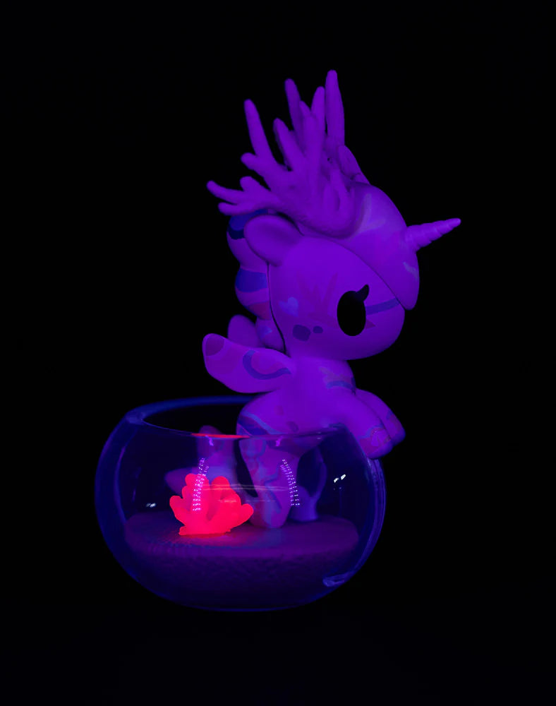 Tokidoki Mermicorno Neon Reef figure Punk Rock Coral glowing under blacklight in a fishbowl base with coral details.