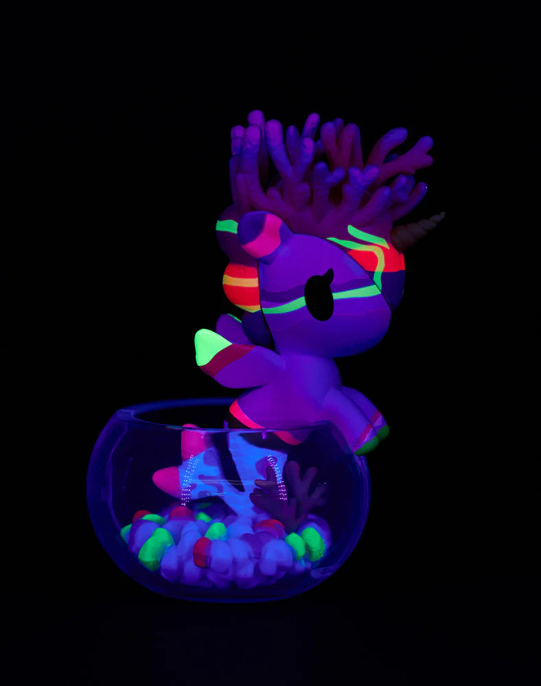 Tokidoki Mermicorno Neon Reef figure Sunset Coral glowing yellow and orange with neon coral reef base.