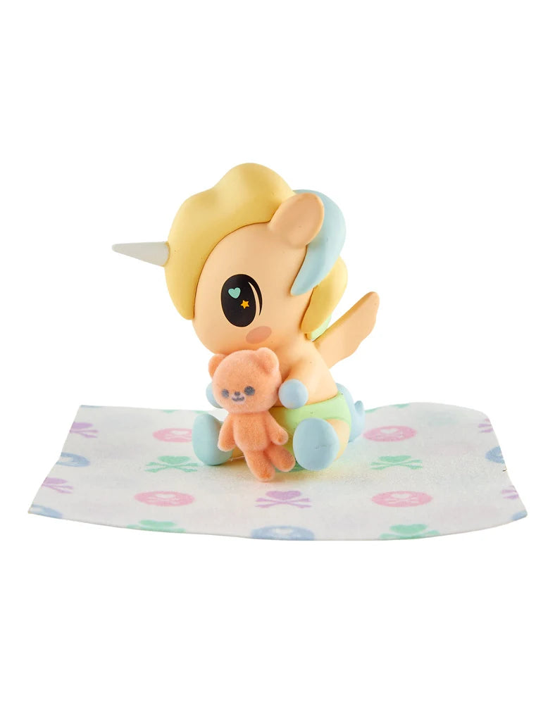 tokidoki Baby Unicorno Teddy Cuddles Chaser figure with teddy bear and blanket