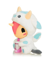 Cozy Unicorno tokidoki collectible figure with warm drink and pastel details
