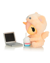 Cozy Unicorno vinyl figure by tokidoki with laptop and ice cream