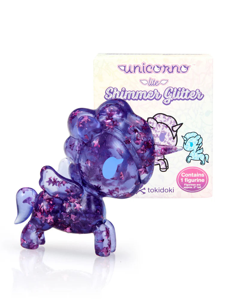 Purple Unicorno Lite Shimmer Glitter figure posed in front of product box