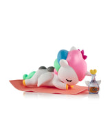 Spa Day Unicorno figure relaxing on towel with oil bottle tokidoki blind box