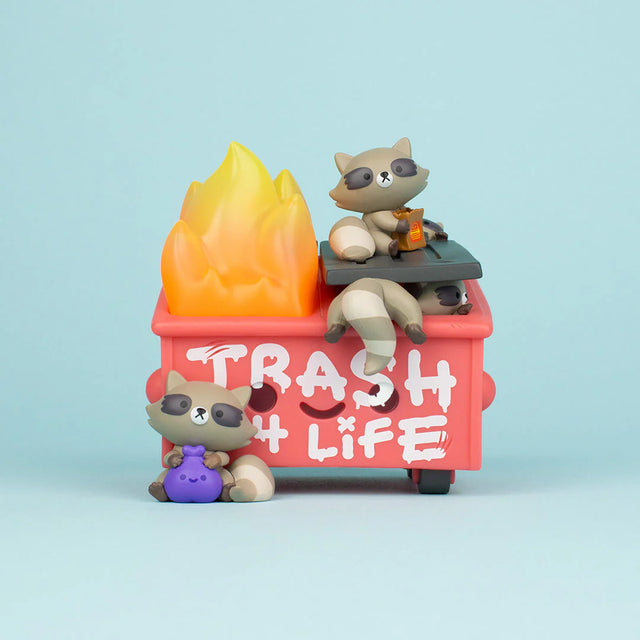 Trash Panda Dumpster Fire vinyl figure front view with raccoons climbing on a graffiti-covered red dumpster
