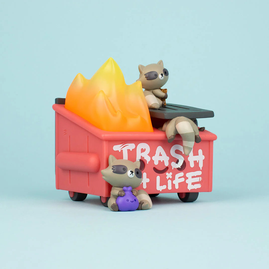 Close-up of Trash Panda Dumpster Fire vinyl figure showing raccoon and flame sculpt details