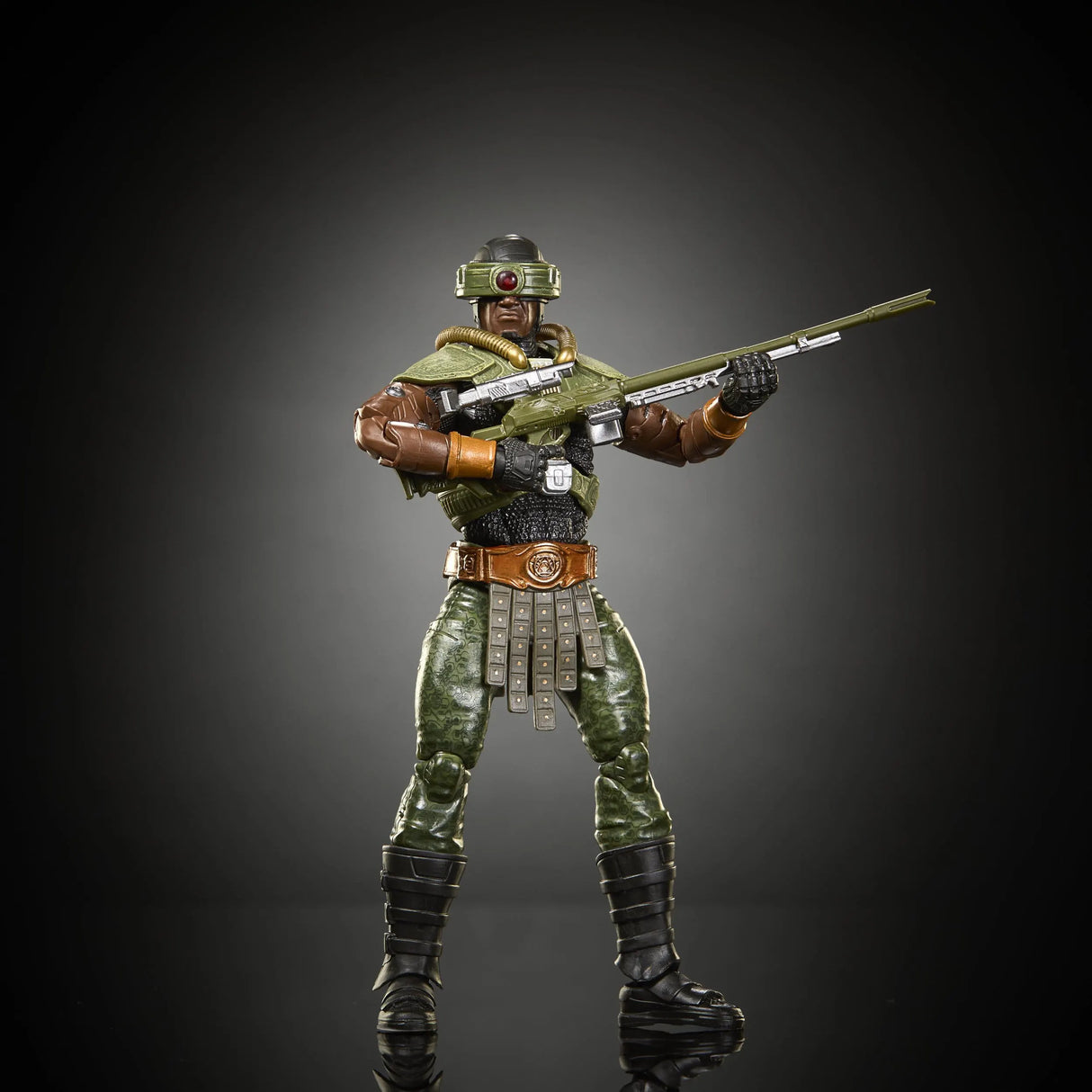 Tri-Klops movie action figure aiming futuristic rifle in battle stance