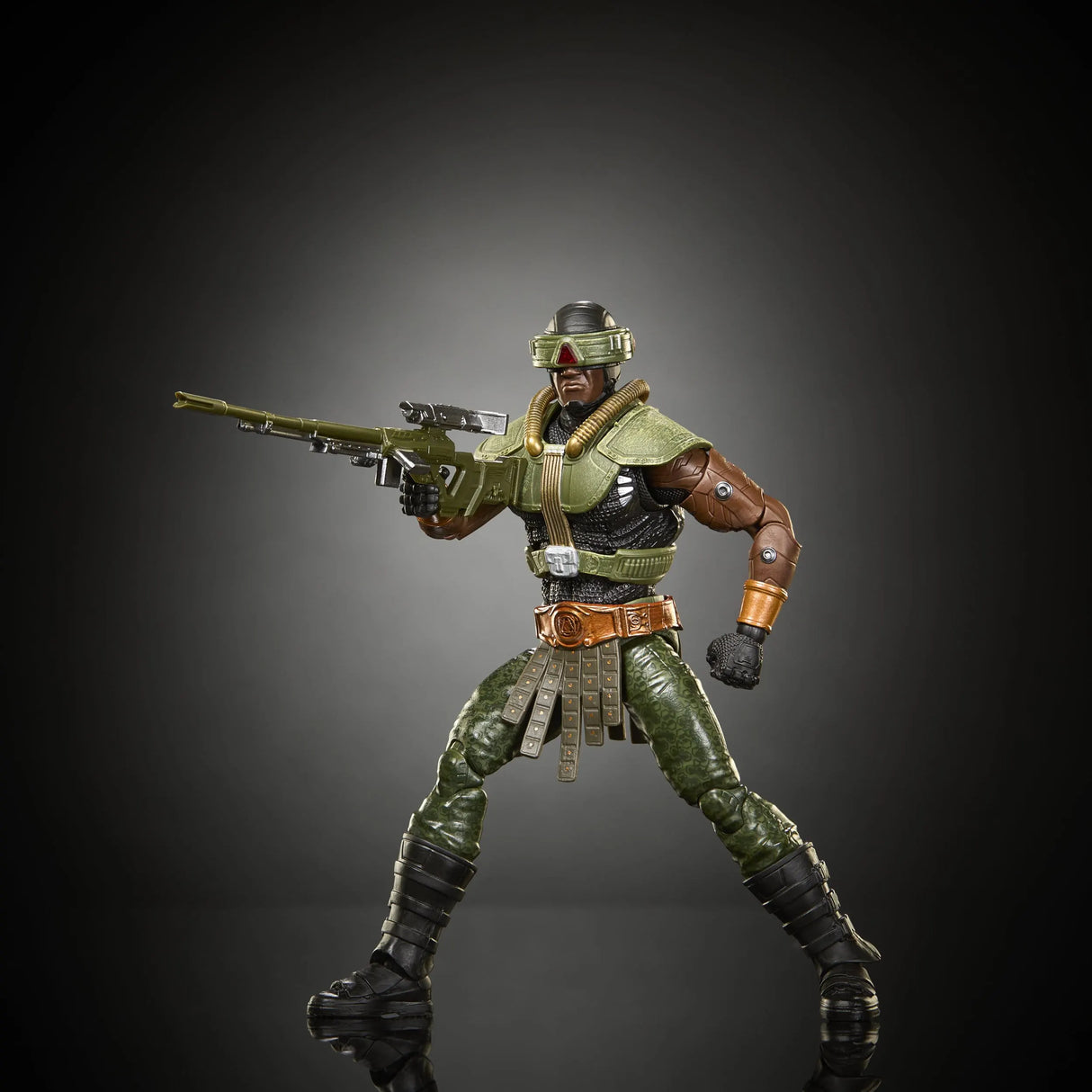 Tri-Klops Masters of the Universe 2026 figure posed with advanced weapon ready for combat