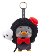 Upset Duck black costume plush keychain with red bow and skull accessory