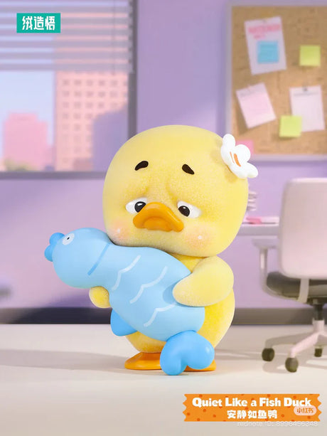 Quiet Like a Fish Duck figure holding a blue fish from Upset Duck Stop the Spiral Duck blind box series.