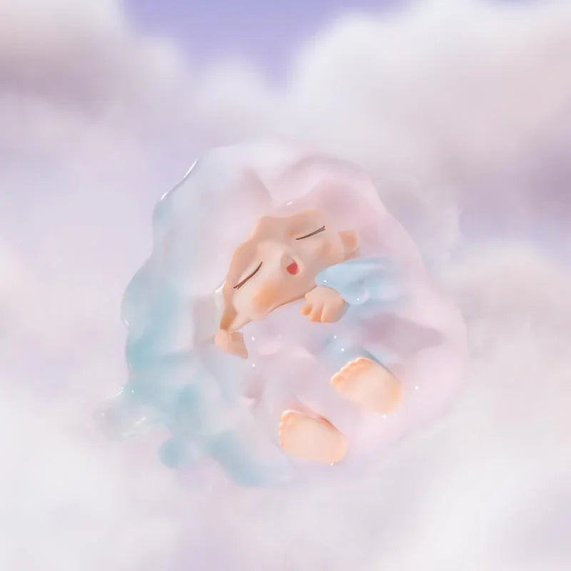 Pastel blue and pink cloud Yumo figure sleeping peacefully.