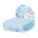 Display case of Yumo My Day blind boxes arranged in cloud-themed retail stand.