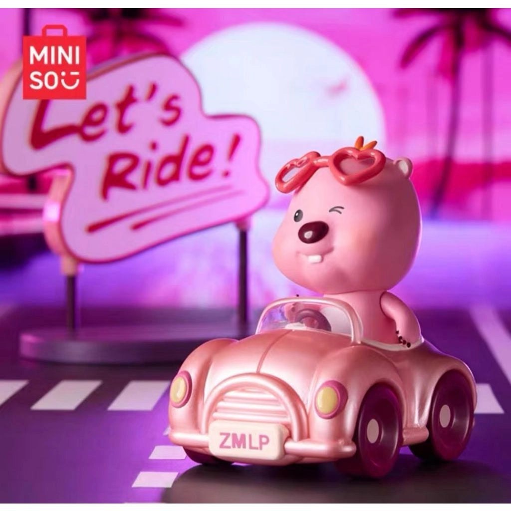 Zanmang Loopy figure driving pink convertible with Let’s Ride sign