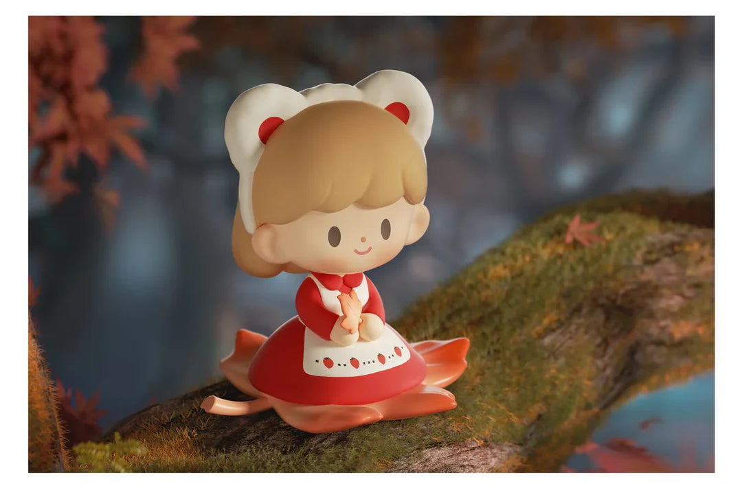 Maple Emissary zZoton figure sitting on a maple leaf in an enchanted forest