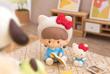 Hello Kitty-themed zZoton figure reading a bedtime story with a Hello Kitty companion