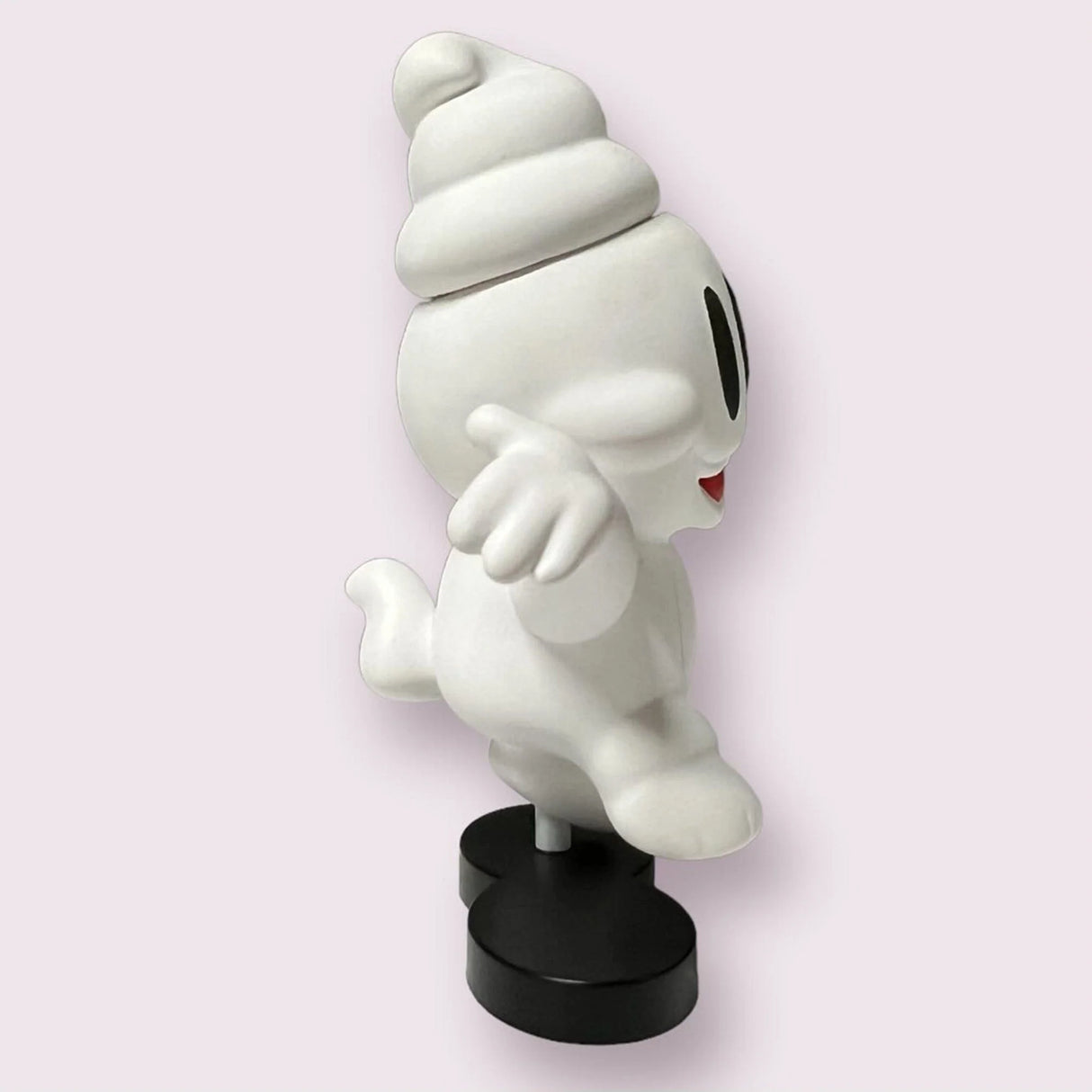 Ripple vinyl toy showing whimsical pose from alternate side